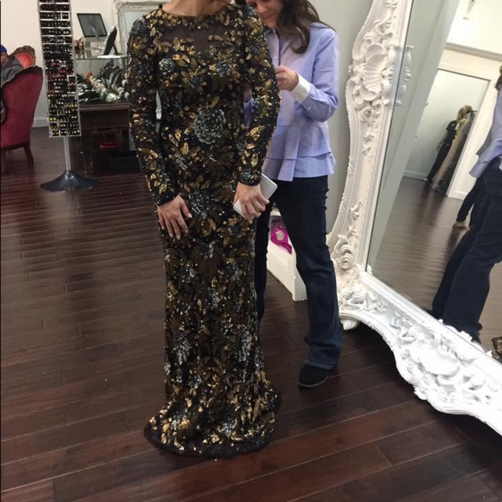 Long sleeve, fully beaded prom dress